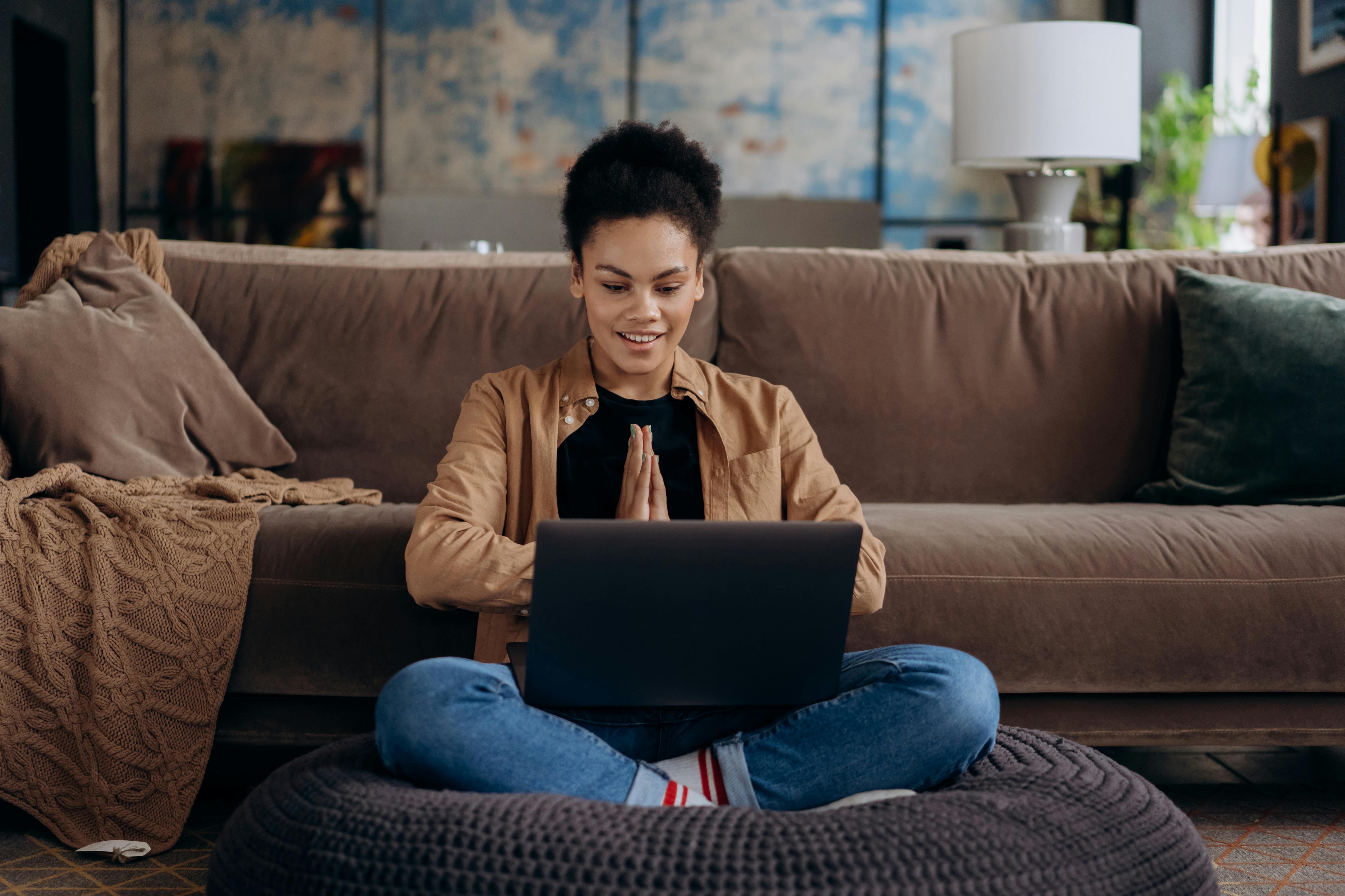 Woman working on a laptop and AI